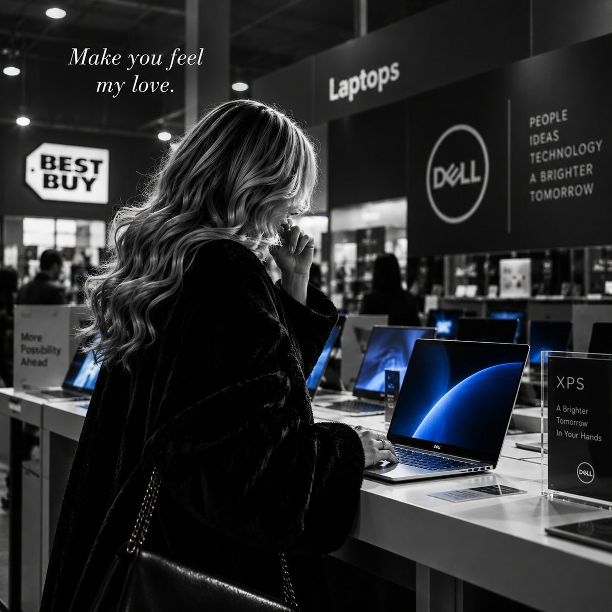 A woman considers Dell laptops at a Best Buy display.